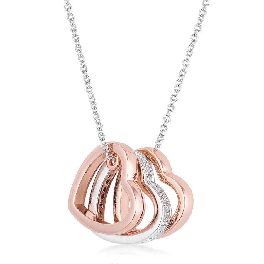 Clear stones accent three heart pendants two inrose goldtoneand one in rosesilver tone. The perfect gift for every girl.-0