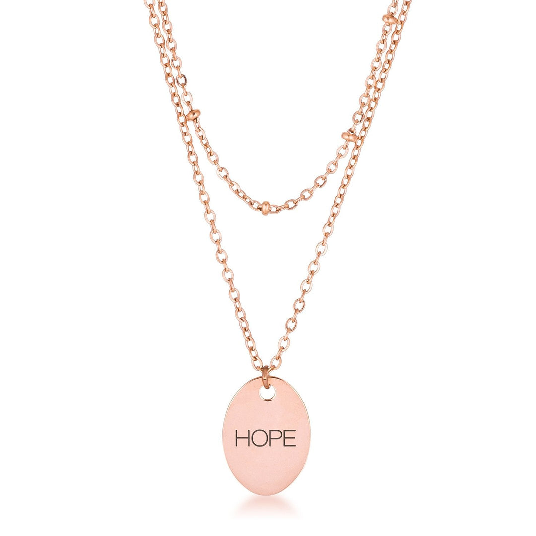This classy necklace features a simple oval pendant inscribed with HOPE hanging from a cable chain. An inner saturn chain adds sophistication to