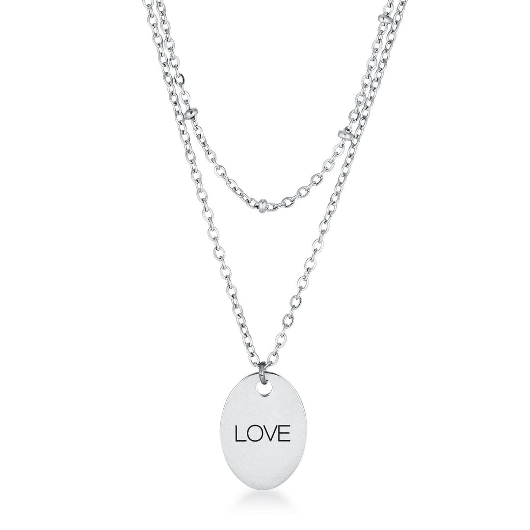 This classy necklace features a simple oval pendant inscribed with LOVE hanging from a cable chain. An inner saturn chain adds sophistication to